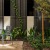 a sitting area with lush landscaping