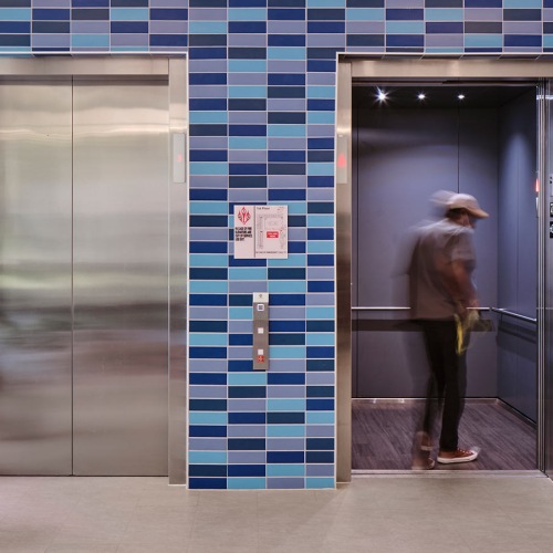 State-of-the-art amenities a person getting into an elevator